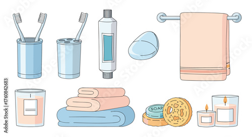 A collection of bathroom accessories including toothbrushes soap and towels.