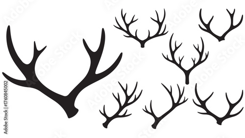 Reindeer antler silhouette as single branching rack with crown base, bold black nordic icon for santa sleigh, woodland, and winter decor