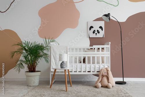 Comfortable crib, bunny toy...