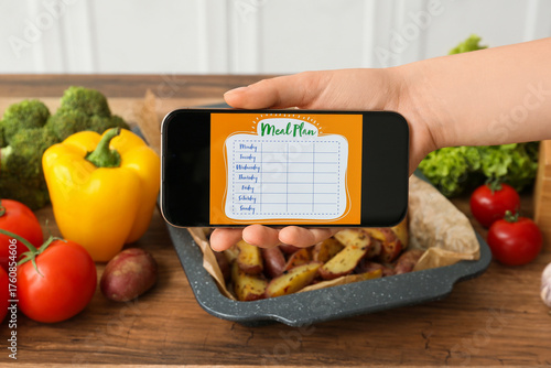 Young woman using meal plan...
