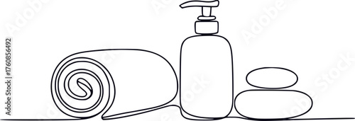 Minimalist spa essentials rolled towel, lotion dispenser, and stacked stones