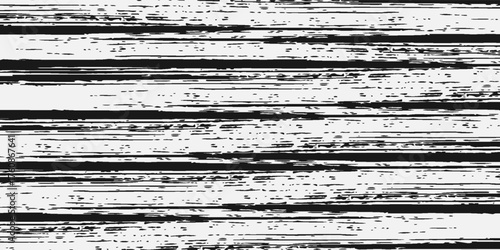 A black and white grunge wooden background. Distressed plank wood surface in monochrome.