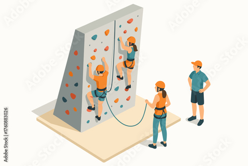 Young people rock climbing indoors with safety gear and instructor guidance