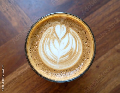 Latte Art - A Heartfelt Coffee Creation on Wooden Table.