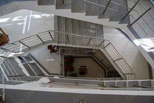 Modern Multi-Level Staircase from Above.
Multi-level staircase viewed from above, with geometric design and stainless steel railings.