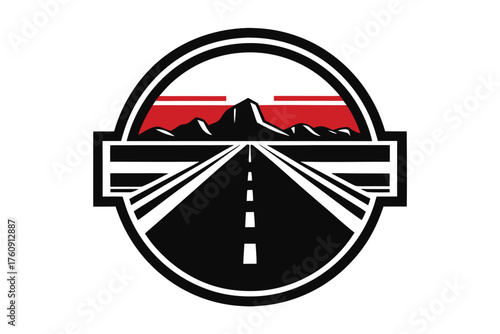 A highway stretches toward distant mountain peaks framed by a bold circular emblem