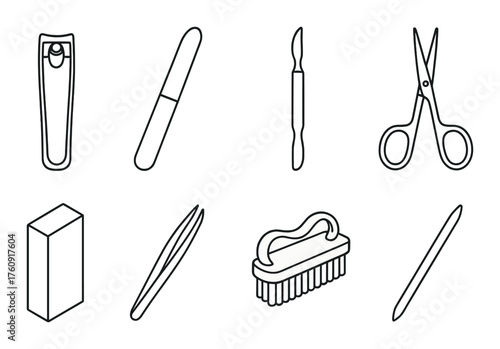 Set of manicure tools with nail clippers, scissors, tweezers, and brush in dark background