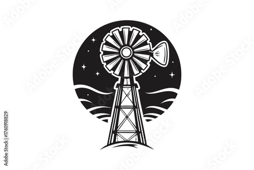 Black and white silhouette reveals a classic windmill against a starry night landscape