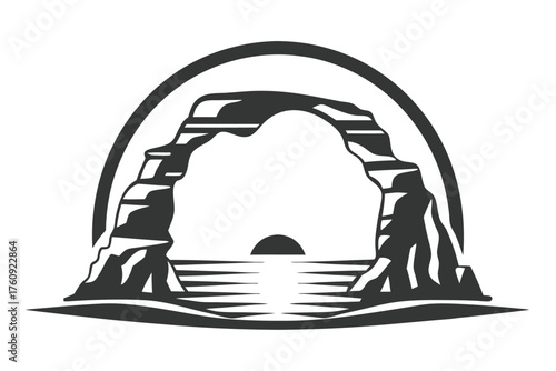 Black rock formation frames ocean waters and a setting sun within an arched backdrop