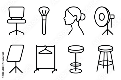 Black silhouette icons for beauty and fashion tools on dark background