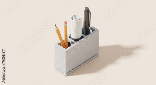 Organization Station: A modern and minimalist desk organizer, housing pens, pencils, and a small cylindrical object, perfectly exemplifies an aesthetically pleasing and organized workspace. 