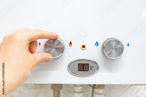 Hand Adjusting Gas Water Heater Temperature Knob