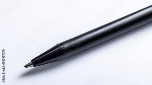 Wallpaper Mural Close up of a black pen on a white paper background. Tool for writing, drawing, and office supply in a minimalist style. Torontodigital.ca