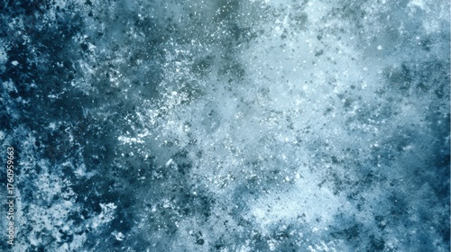 A mesmerizing display of icy textures and shades of blue fills the view, evoking the wintry atmosphere and capturing natures serene elegance.