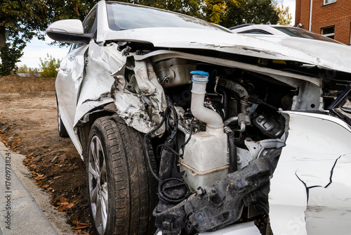 front side view of crashed car from accident