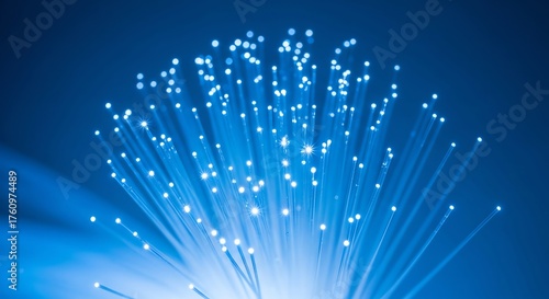 Blue Fiber Optic Cables with Bright Light Effect on Dark Background