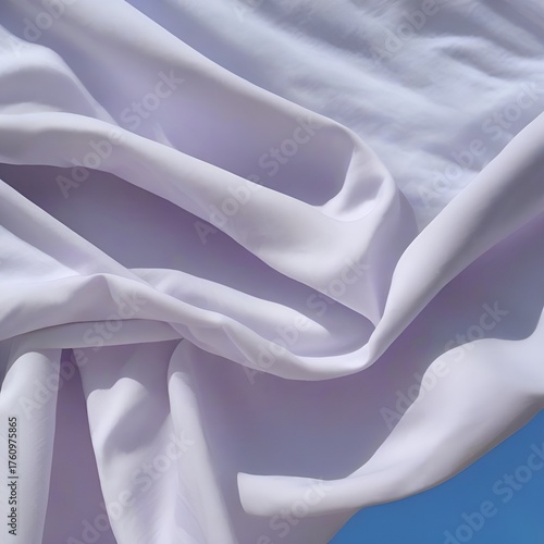Close-up of white fabric on blue background