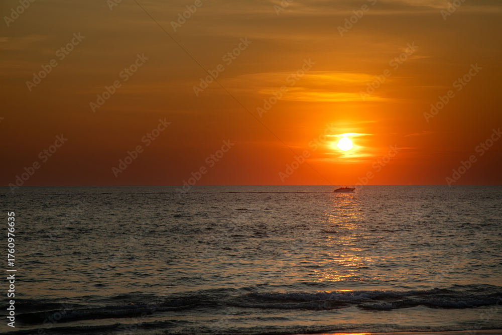 Obraz premium Beautiful sunset in the desert. Desert near the sea. Colorful sky. Warm summer evening. 