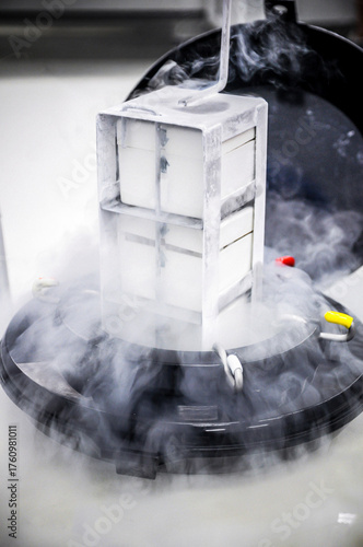 Close-up Sperm freezing tank storage with liquid nitrogen vapor in laboratory