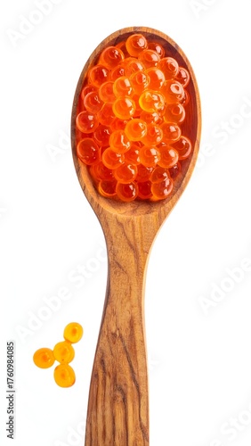 Bright red fish roe presented in a wooden spoon, against a white background
