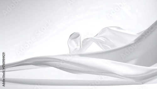 Elegant, flowing white fabric against a soft, graduated white background