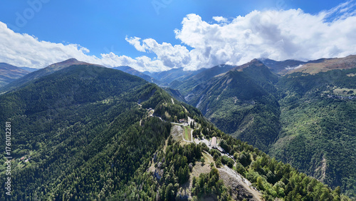 Fotografie Alpine summer landscape with green mountain forests at Col du Telegraphe pass, Savoie, Auvergne-Rhone-Alpes, France, Europe