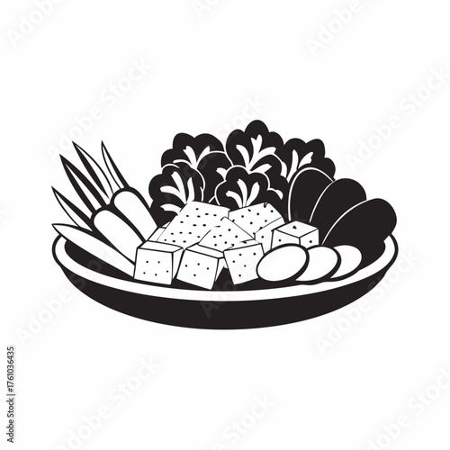 Fresh vegetable platter with tofu, lettuce, carrots, and radishes arranged beautifully in a bowl. Healthy vegetable platter features colorful ingredients including tofu and green salad.