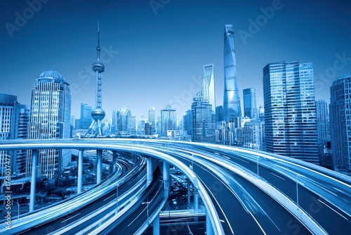 Dynamic urban skyline showcasing futuristic architecture and busy highways illuminated by vibrant city lights highlighting modernity and innovation in metropolitan landscapes