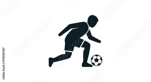 Silhouette of a soccer player dribbling a ball in action.