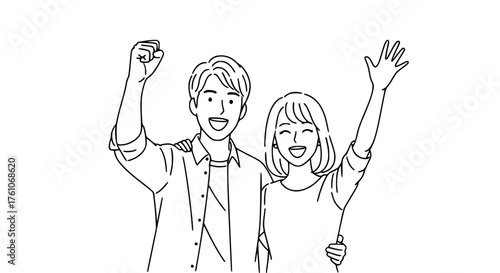 Happy Couple Celebrating Together with Arms Raised in Victory