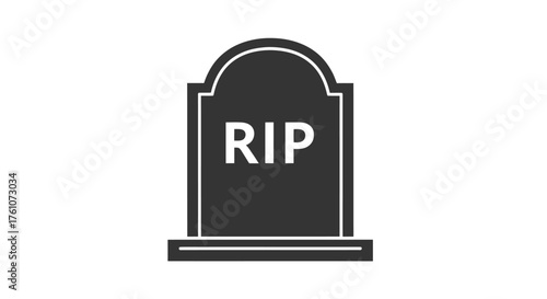 A simple dark gray tombstone with RIP inscribed on its surface.
