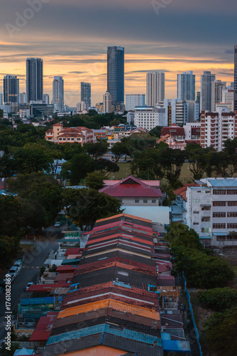 Sunset Skyline of George Town, Penang with Colorful Rooftops and Modern Buildings