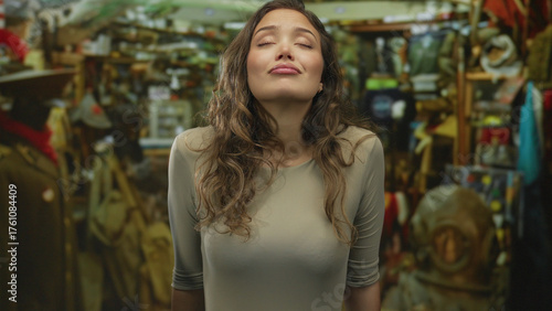 Wallpaper Mural Woman breathing with chest rising amid clothes racks in a building filled with vintage apparel shelves; serenity. Torontodigital.ca