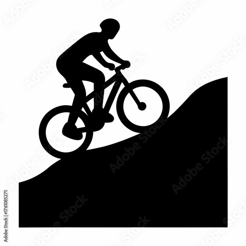 A silhouetted figure mountain biking uphill, embodying challenge and adventure