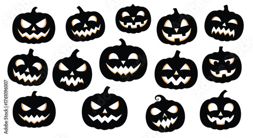 A collection of carved jack o lantern pumpkins with glowing faces.