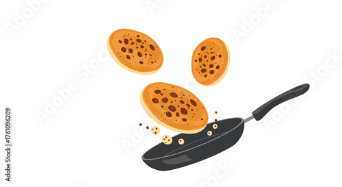 Making delicious pancakes on a hot skillet with batter flipping in the air.