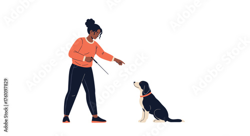 A woman is training her dog to sit using hand signals and positive reinforcement techniques.
