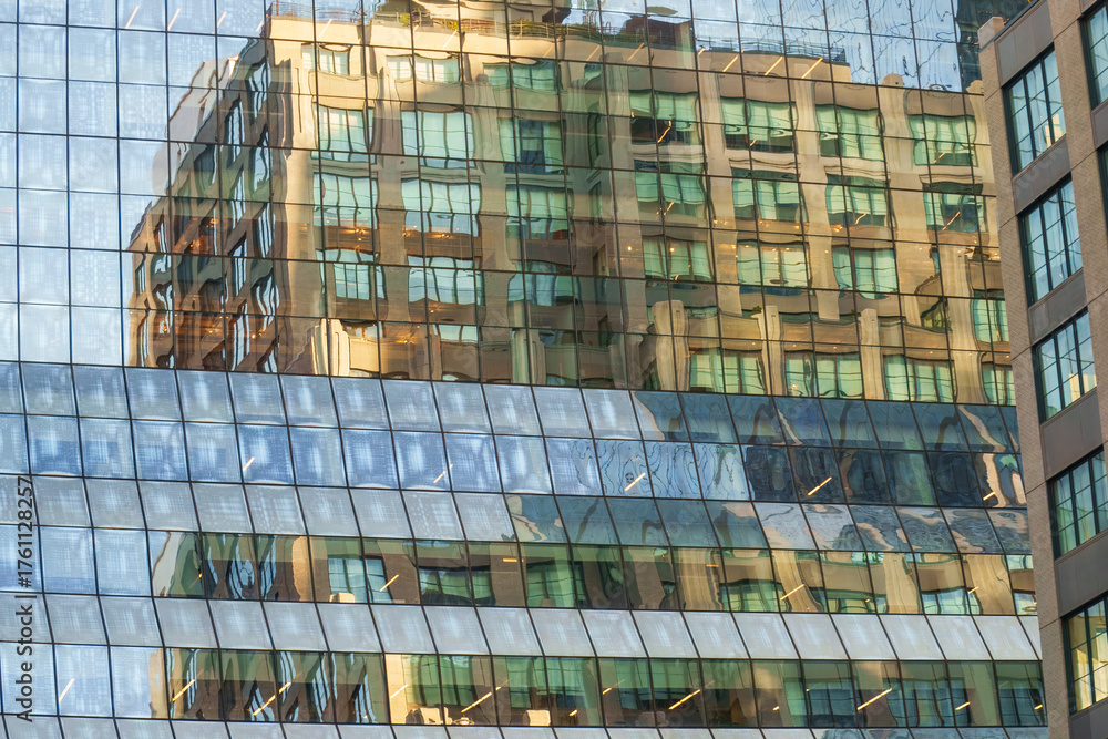 Obraz premium New York - aerial view and details of the city's skyscrapers (blue hour), abstract view of skyscraper's facade 