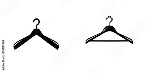 Two simple black clothing hangers displayed side by side against a white background for clear visibility and focus