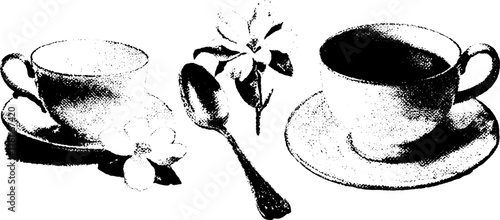 High contrast black and white tea cup and saucer set with floral accents for vintage design