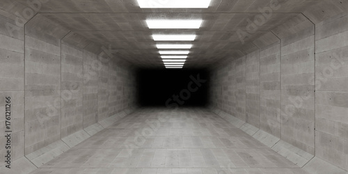 Empty concrete tunnel with bright lights