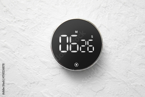 Modern kitchen timer on whi...