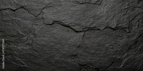 black concrete wall , grunge stone texture , dark gray rock surface background panoramic wide banner