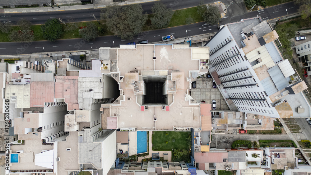 Fototapeta premium Geometric-shaped building seen from above by a drone.