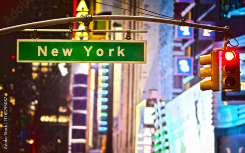 New York sign and red stop light in New York City at night