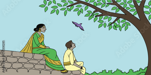 A woman in a green sari and a man in a yellow kurta sit outdoors looking at a purple bird flying in the sky under a tree.