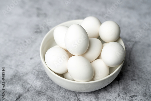 Bowl of white and freshly boiled eggs 