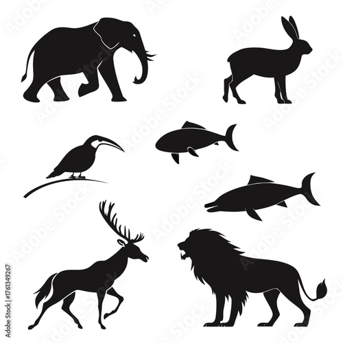 Collection of diverse animal silhouettes including an elephant rabbit bird fish dolphin deer and lion against a white background