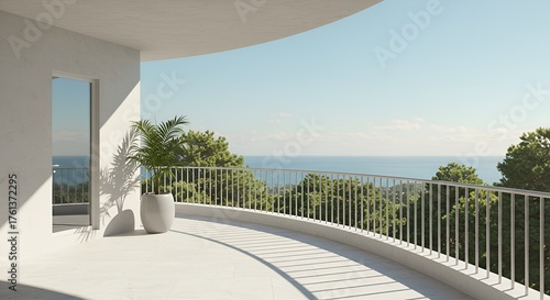 Elegant, curved balcony with ocean view is enhanced by potted plant and white architectural design.