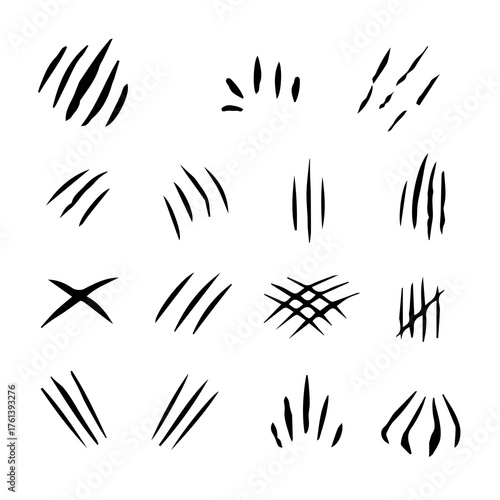 Collection of black claw marks and scratches on white background